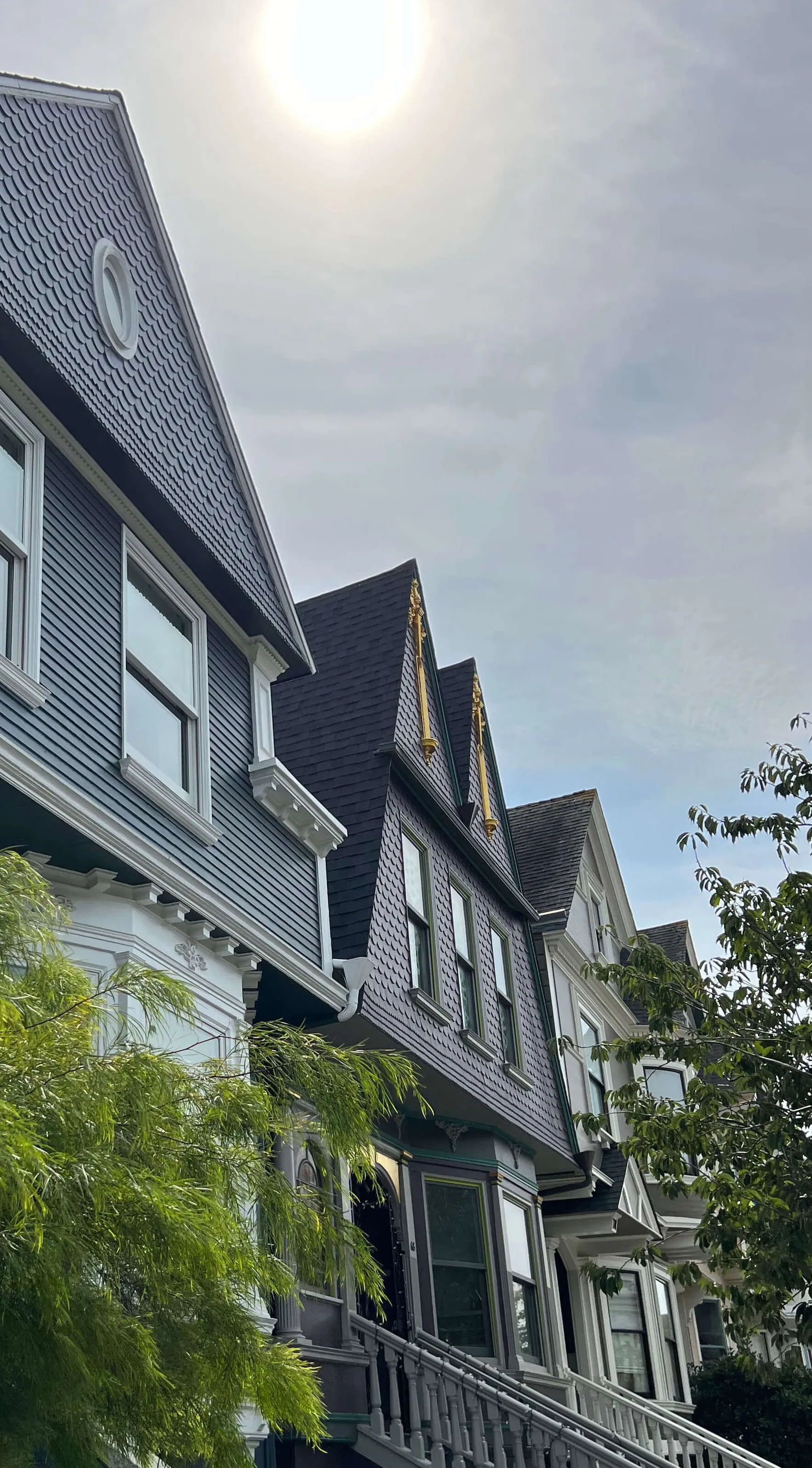 Freshly painted San Francisco Victorian homes with detailed white trim